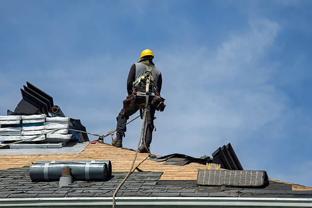 Professional Roofing technician working in Howard, WI
